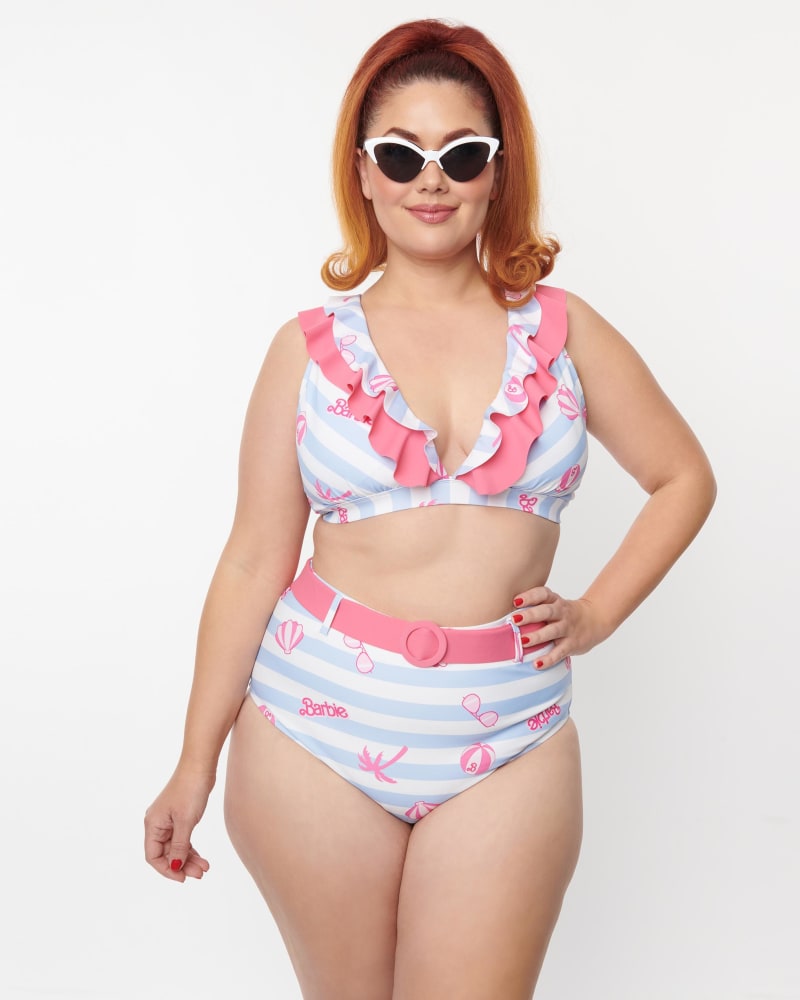 Front of a model wearing a size 3X Barbie x Unique Vintage Malibu Beach Print Ruffle Swim Top in White, Blue, Pink, Striped by Unique Vintage. | dia_product_style_image_id:287917